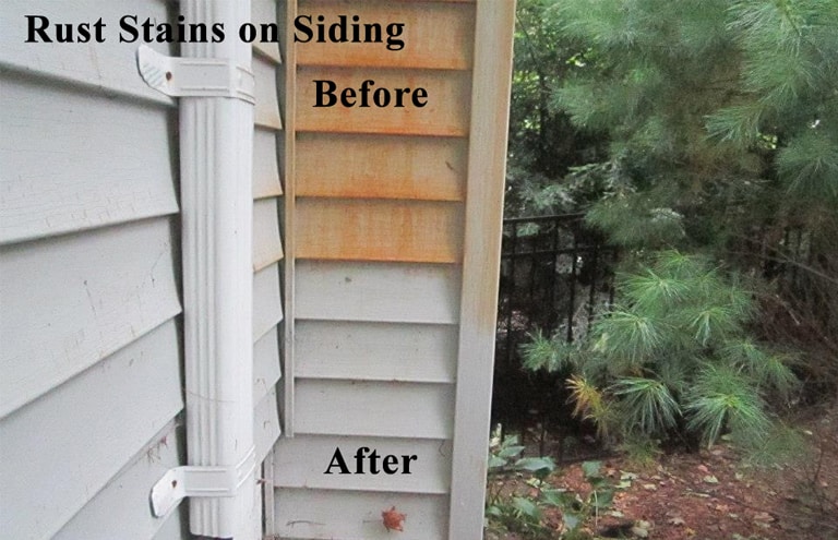 Rust on Siding of a House Showing Before and After Soft Wash