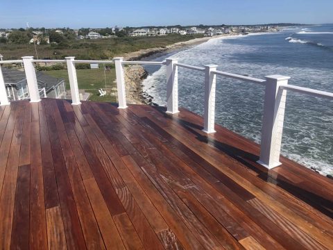 Power Washed Wooden Deck with View of the Ocean in the Background