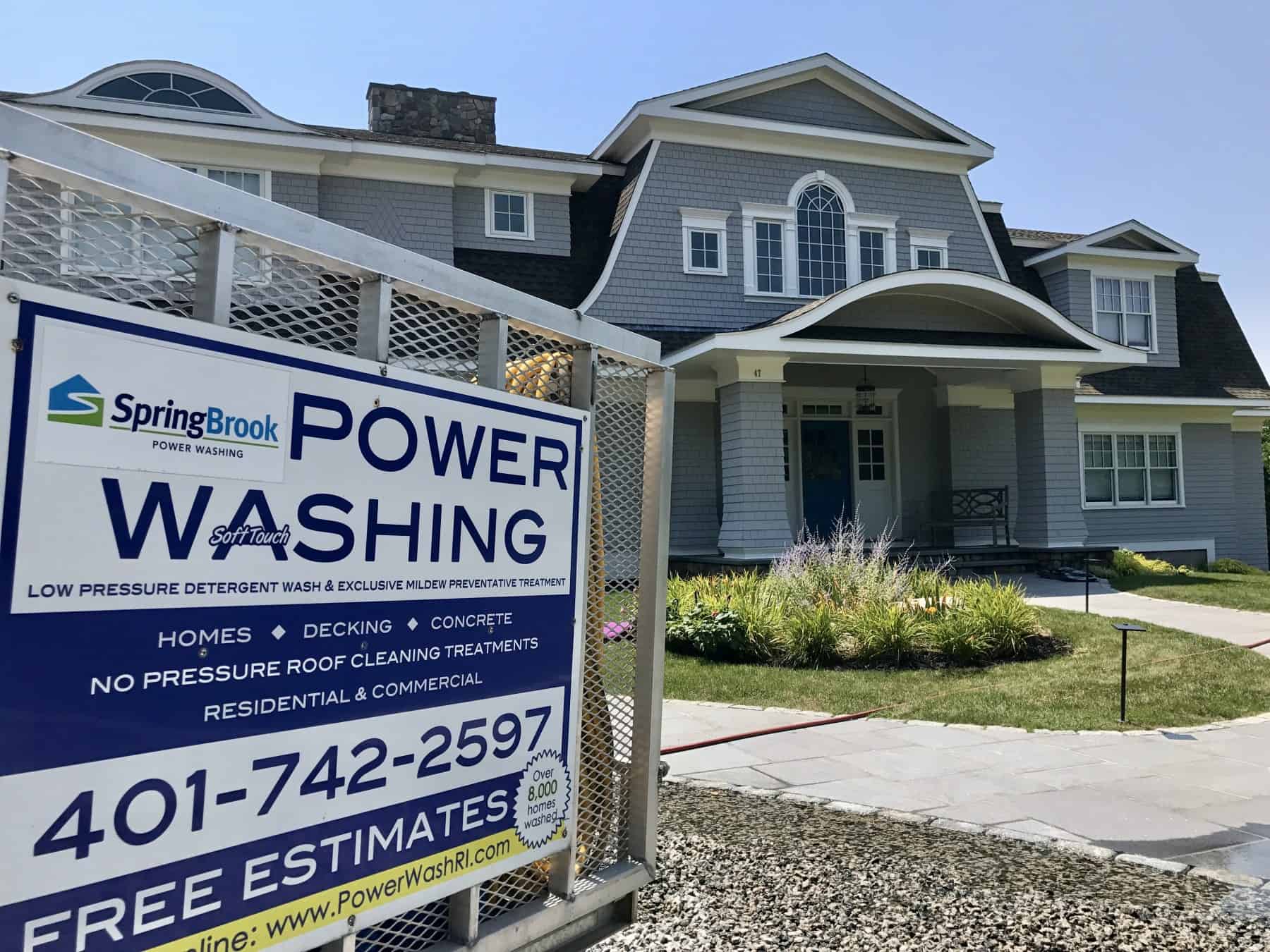 SpringBrook Power Washing Sign in Front of a House in Rhode Island