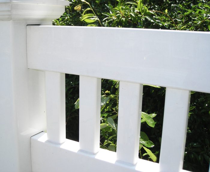 White Vinyl Fence After Power Washing